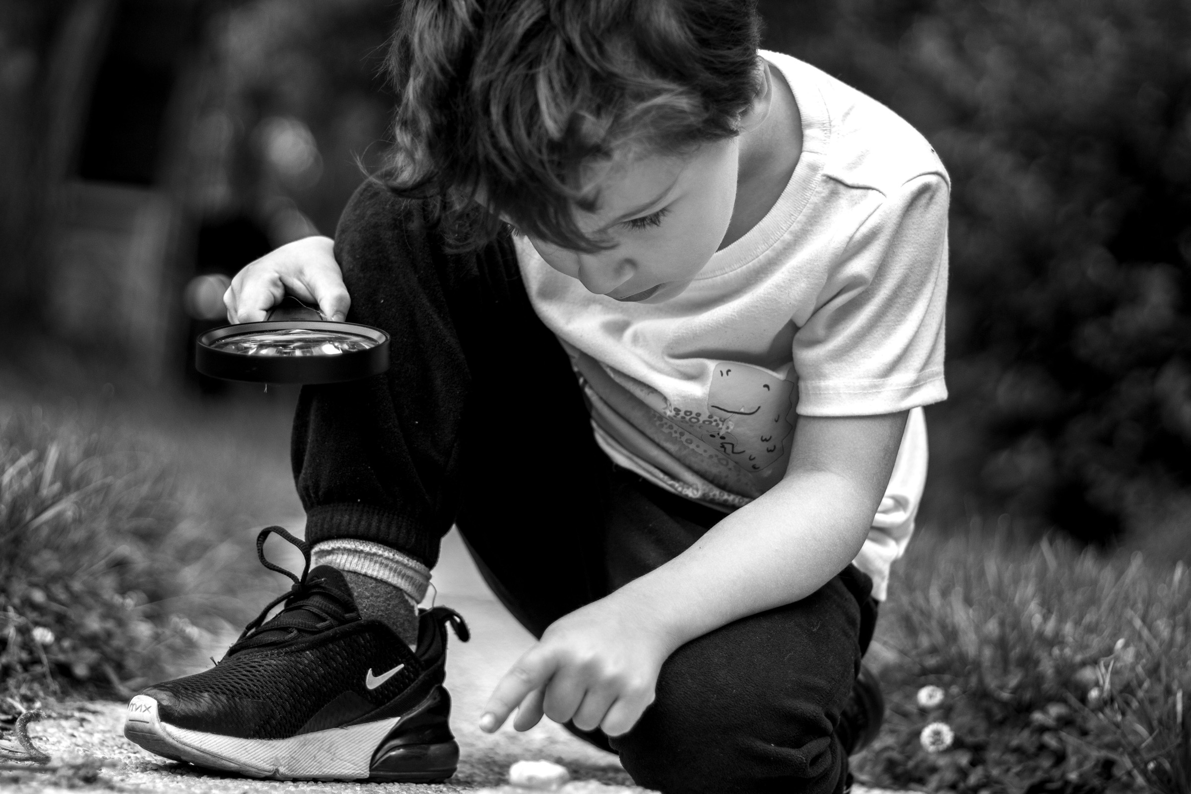 He searches the ground for small treasures